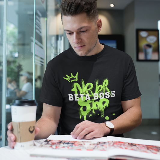 a man drinking a coffee in a shop wearing a black climbing t-shirt