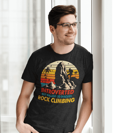 Get ready to rock climb in style with this playful 'Introverted but will talk about rock climbing' t-shirt. Made with 100% lightweight cotton, this tee is perfect for layering and casual wear. Show off your love for rock climbing with a unique twist and make your fellow climbers smile. 